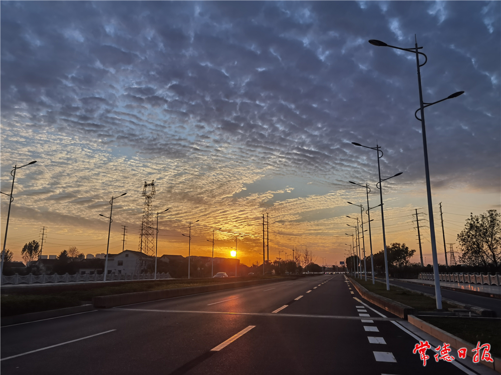 sj單家春-夕陽下的太陽大道-1.jpg
